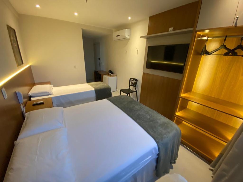 Suite Tripla Hotel America Кампус-дус-Гойтаказис Экстерьер фото